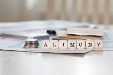 Blocks spelling out alimony